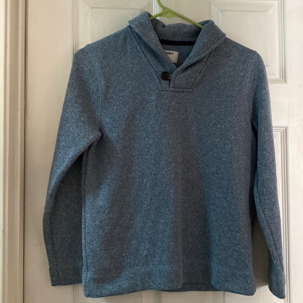 Light Blue sweater with 1 button at the collar
